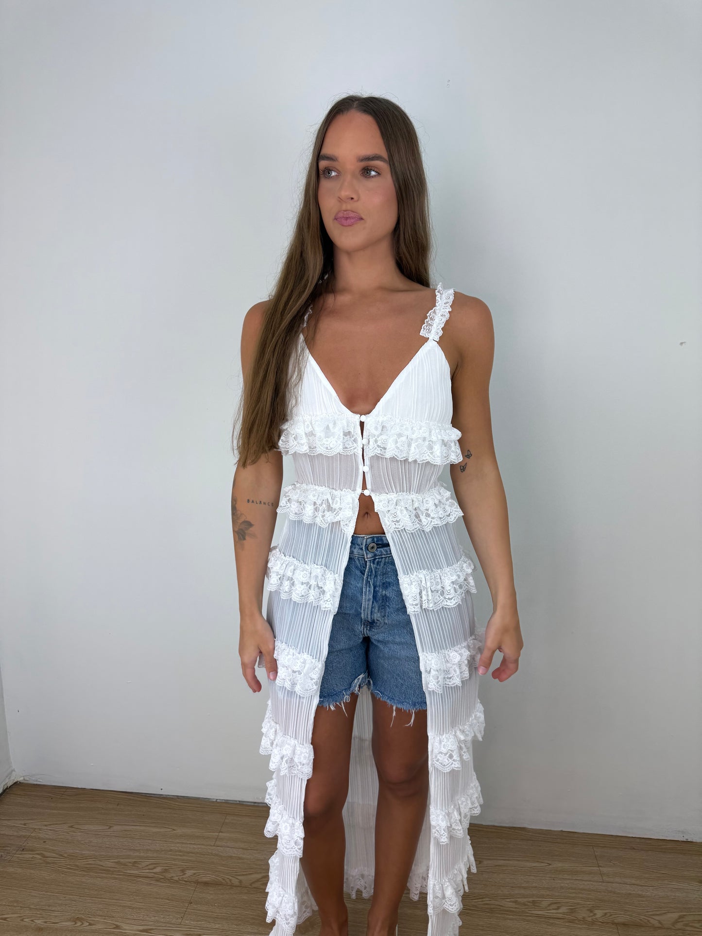 Quiet luxury white ruffle tunic