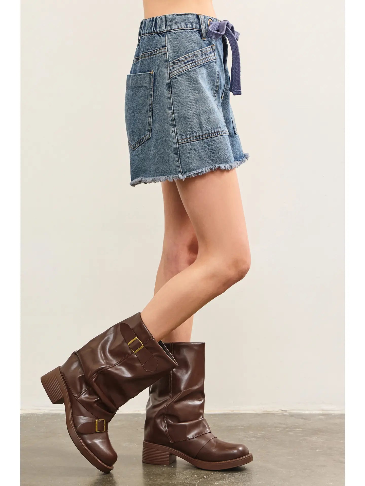 Tied front raw edge denim shorts