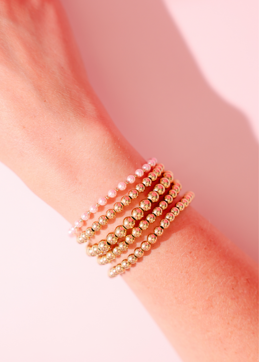 Pink Mini Luci Bracelet in Gold: Standard 6.75 inch