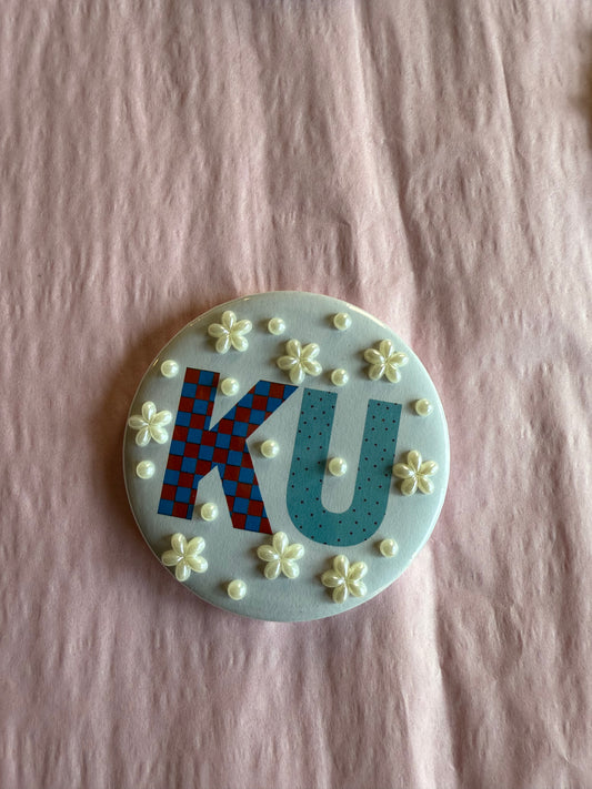 KU pearls button
