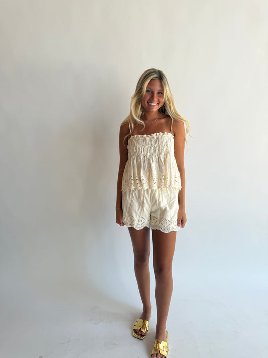 Woven eyelet flare shorts