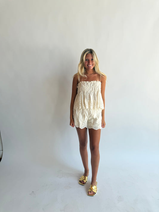 Woven eyelet flare shorts