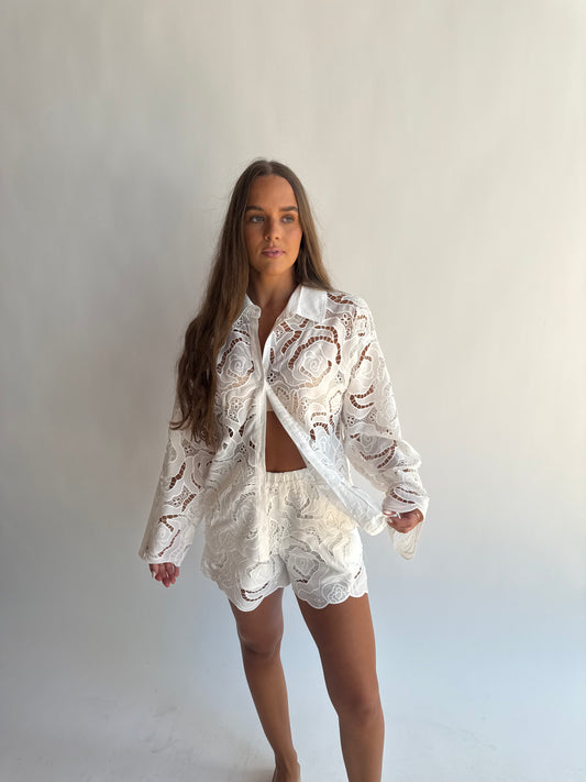 Floral eyelet patterned shorts