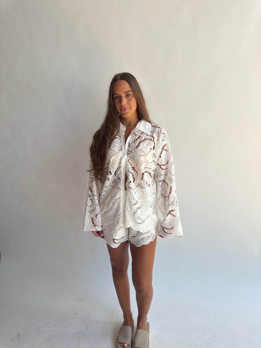 Floral eyelet patterned shorts