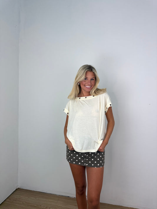 Metal trim eyelet top