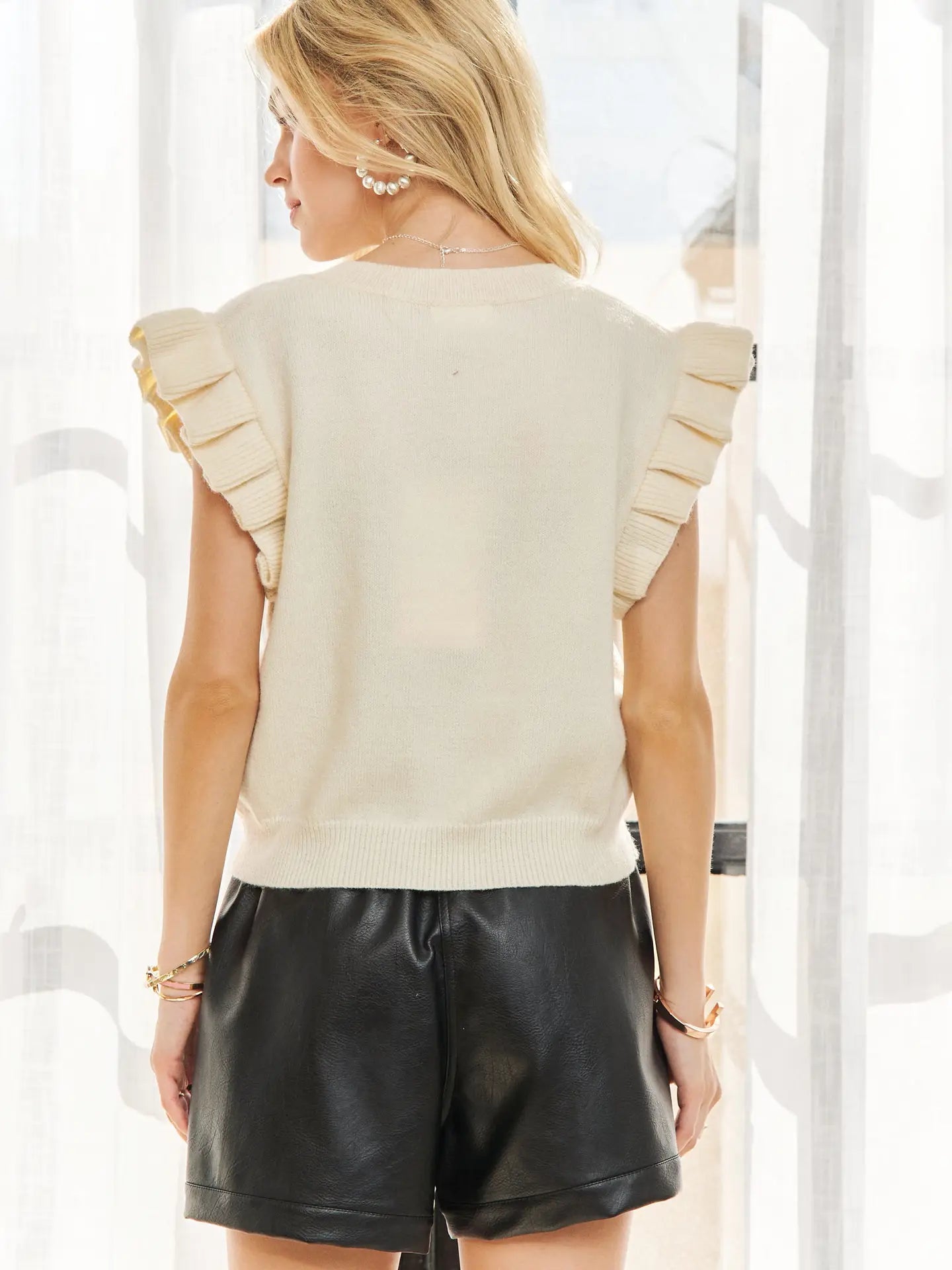 Ruffled cap sleeve sweater vest